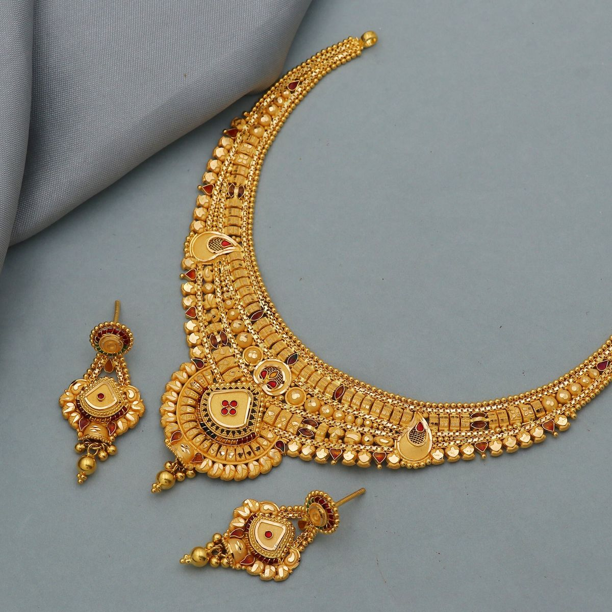Ornate 21K yellow gold bridal necklace and matching earrings